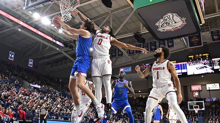 Dec 17, 2025; Spokane, Washington, USA; Gonzaga Bulldogs forward Braden Huff (34) shoots the ball against Campbell Fighting Camels forward Chris Fields Jr. (0) in the first half at McCarthey Athletic Center. Mandatory Credit: James Snook-Imagn Images Dec 17, 2025; Spokane, Washington, USA; Gonzaga Bulldogs forward Braden Huff (34) shoots the ball against Campbell Fighting Camels forward Chris Fields Jr. (0) in the first half at McCarthey Athletic Center. Mandatory Credit: James Snook-Imagn Images