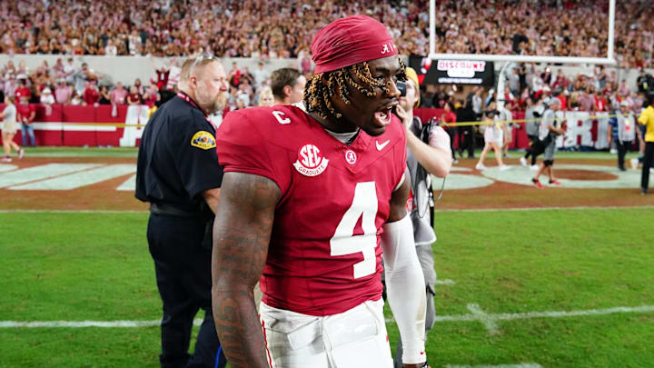 Sep 28, 2024; Tuscaloosa, Alabama, USA;  Alabama Crimson Tide quarterback Jalen Milroe (4) celebrates after defeating the Georgia Bulldogs at Bryant-Denny Stadium. Mandatory Credit: John David Mercer-Imagn Images