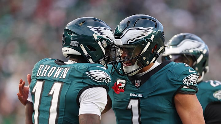 Jan 26, 2025; Philadelphia, PA, USA; Philadelphia Eagles quarterback Jalen Hurts (1) and wide receiver A.J. Brown (11) celebrate after a touchdown against the Washington Commanders during the first half in the NFC Championship game at Lincoln Financial Field. Mandatory Credit: Bill Streicher-Imagn Images