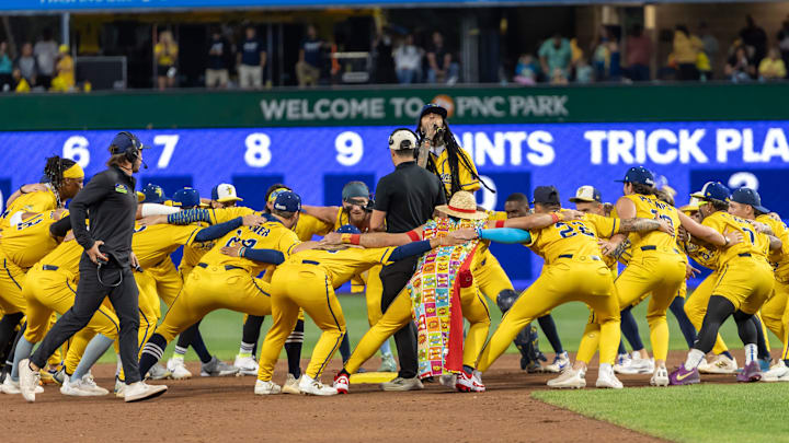 Travie McCoy stands amongst the Savannah Bananas players during the Savannah Bananas game against the Texas Tailgaters Saturday, Aug. 30, 2025 at PNC Park in Pittsburgh, Pa.