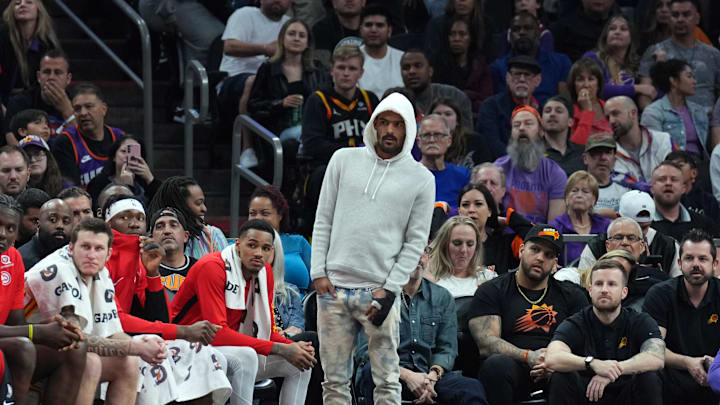 Mar 21, 2024; Phoenix, Arizona, USA; Atlanta Hawks player Trae Young looks on against the Phoenix