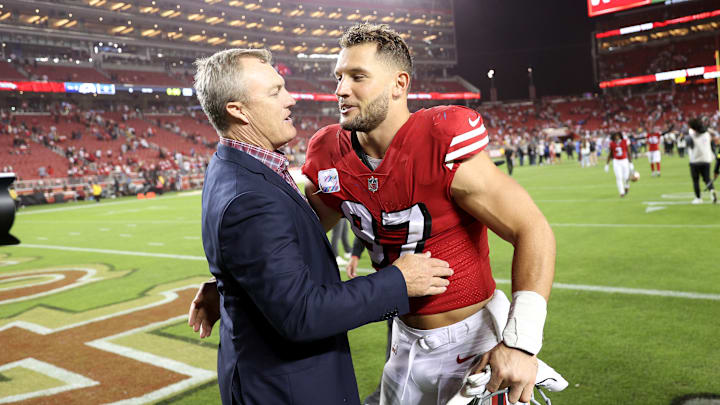 San Francisco 49ers general manager John Lynch (L) and defensive end Nick Bosa (R)