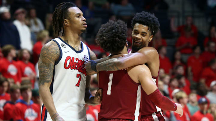 Feb 28, 2024; Oxford, Mississippi, USA; Alabama Crimson Tide guard Aaron Estrada (55) embraces with