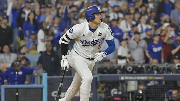 Oct 25, 2024; Los Angeles, California, USA; Los Angeles Dodgers designated hitter player Shohei Ohtani (17) hits a double in the eighth inning against the New York Yankees during game one of the 2024 MLB World Series at Dodger Stadium. Mandatory Credit: Jayne Kamin-Oncea-Imagn Images Oct 25, 2024; Los Angeles, California, USA; Los Angeles Dodgers designated hitter player Shohei Ohtani (17) hits a double in the eighth inning against the New York Yankees during game one of the 2024 MLB World Series at Dodger Stadium. Mandatory Credit: Jayne Kamin-Oncea-Imagn Images