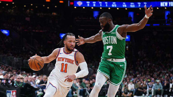 Jalen Brunson drives on Jaylen Brown during the Eastern Conference semifinals.