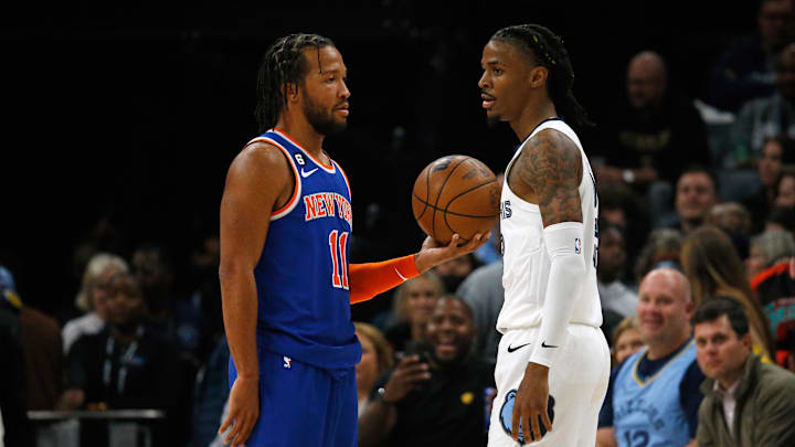 New York Knicks guard Jalen Brunson (left) and Memphis Grizzlies guard Ja Morant (right) talk during a timeout during the first half at FedExForum. Mandatory Credit: Petre Thomas-Imagn Images
