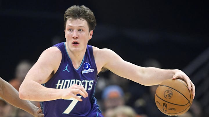 Dec 22, 2025; Cleveland, Ohio, USA; Charlotte Hornets guard Kon Knueppel (7) dribbles the ball in the first quarter against the Cleveland Cavaliers at Rocket Arena. Mandatory Credit: David Richard-Imagn Images
