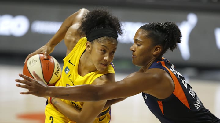 Sep 17, 2020; Palmetto, Florida, USA; Connecticut Sun forward Alyssa Thomas (25) reaches in on Los Angeles Sparks forward Candace Parker (3) during the first half at the FELD entertainment complex. Mandatory Credit: Reinhold Matay-Imagn Images Sep 17, 2020; Palmetto, Florida, USA; Connecticut Sun forward Alyssa Thomas (25) reaches in on Los Angeles Sparks forward Candace Parker (3) during the first half at the FELD entertainment complex. Mandatory Credit: Reinhold Matay-Imagn Images