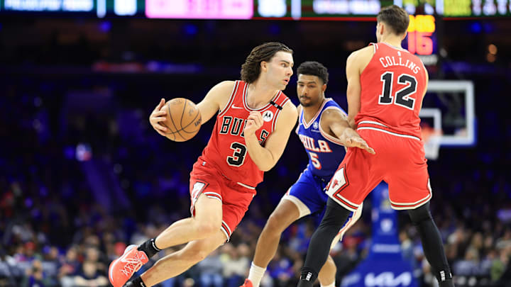 Feb 24, 2025; Philadelphia, Pennsylvania, USA; Chicago Bulls guard Josh Giddey (3) drives around Philadelphia 76ers guard Quentin Grimes (5) during the third quarter at Wells Fargo Center. Mandatory Credit: Bill Streicher-Imagn Images Feb 24, 2025; Philadelphia, Pennsylvania, USA; Chicago Bulls guard Josh Giddey (3) drives around Philadelphia 76ers guard Quentin Grimes (5) during the third quarter at Wells Fargo Center. Mandatory Credit: Bill Streicher-Imagn Images