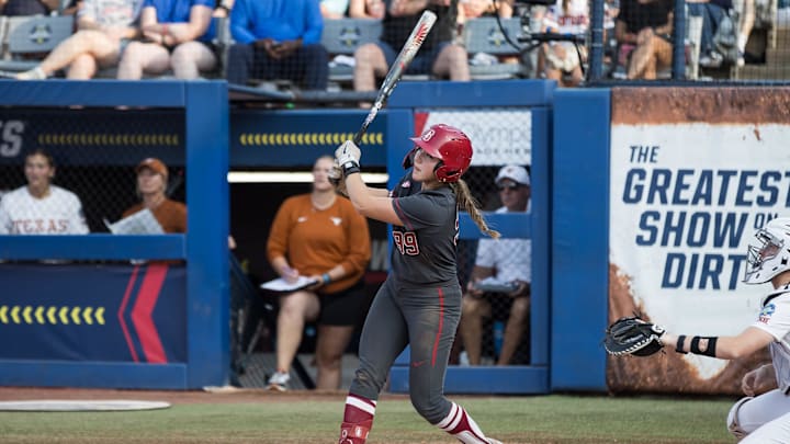 Jun 3, 2024;  Oklahoma City, OK, USA;  Stanford Cardinals infielder Taryn Kern (99) watches the ball to the outfield in the fourth inning against the Texas Longhorns during a Women's College World Series softball semifinal game at Devon Park. Mandatory Credit: Brett Rojo-Imagn Images