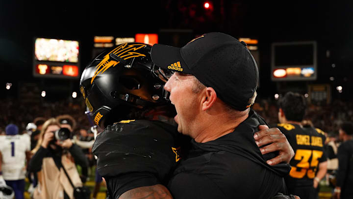 Sep 26, 2025; Tempe, Arizona, USA; Arizona State Sun Devils head coach Kenny Dillingham celebrates win with defensive back Myles Rowser (4) against TCU Horned Frogs at Mountain America Stadium, Home of the ASU Sun Devils. Mandatory Credit: Jacob Reiner-Imagn Images