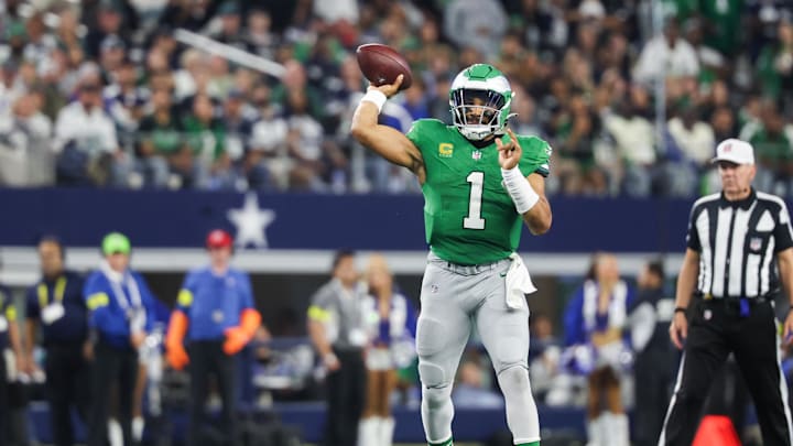 Nov 23, 2025; Arlington, Texas, USA; Philadelphia Eagles quarterback Jalen Hurts (1) throws the ball in the fourth quarter against the Dallas Cowboys at AT&T Stadium. 