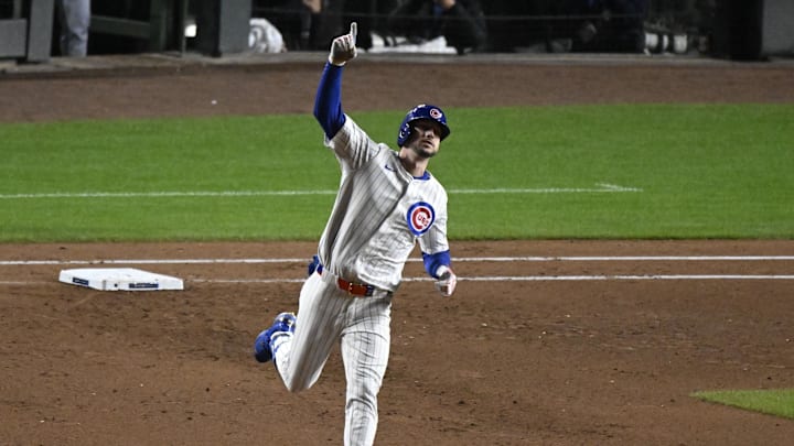 Kyle Tucker of Chicago Cubs rounds bases after home run