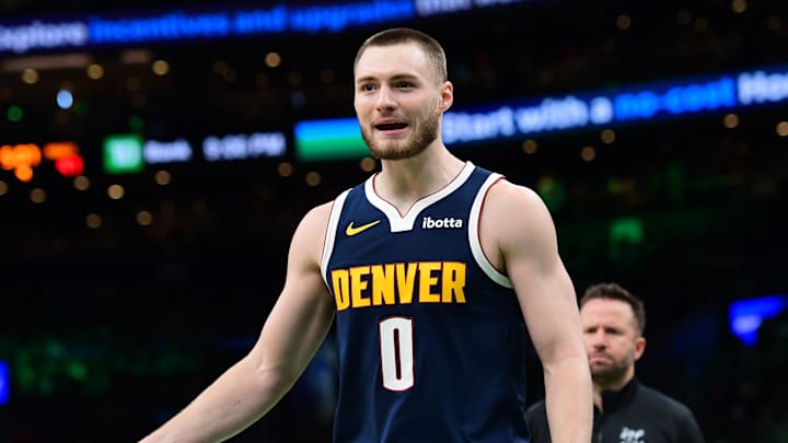 Jan 7, 2026; Boston, Massachusetts, USA; Denver Nuggets guard Christian Braun (0) reacts after a play during the second half against the Boston Celtics at TD Garden. Mandatory Credit: Bob DeChiara-Imagn Images