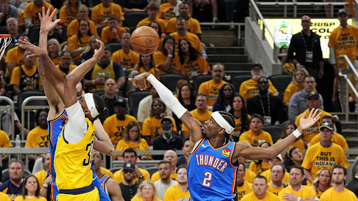 Jun 11, 2025; Indianapolis, Indiana, USA; Indiana Pacers center Myles Turner (33) drives to the basket against Oklahoma City Thunder guard Shai Gilgeous-Alexander (2)  in game three of the 2025 NBA Finals at Gainbridge Fieldhouse. Mandatory Credit: Kyle Terada-Imagn Images