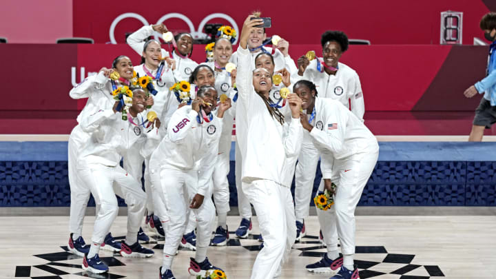 Aug 8, 2021; Saitama, Japan; The United States celebrates winning the gold medal against Japan in the women's basketball gold medal match during the Tokyo 2020 Olympic Summer Games at Saitama Super Arena. Mandatory Credit: James Lang-USA TODAY Sports