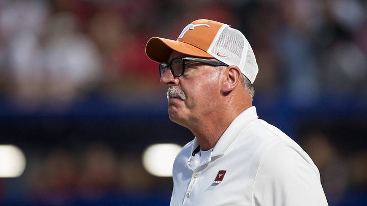 Texas Longhorns head coach Mike White walks out to the coaches box in the sixth inning against the Texas Tech Red Raiders. Texas Longhorns head coach Mike White walks out to the coaches box in the sixth inning against the Texas Tech Red Raiders.