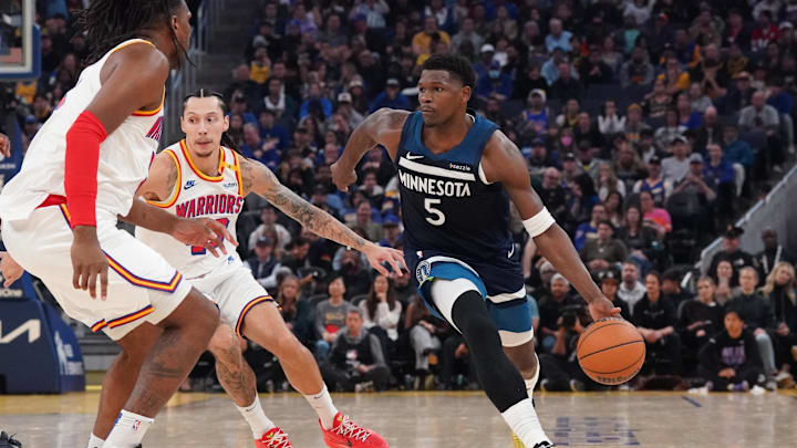 Minnesota Timberwolves guard Anthony Edwards (5) drives to the basket against Golden State Warriors forward Lindy Waters III in the second quarter at Chase Center in San Francisco on Dec. 8, 2024. Minnesota Timberwolves guard Anthony Edwards (5) drives to the basket against Golden State Warriors forward Lindy Waters III in the second quarter at Chase Center in San Francisco on Dec. 8, 2024.