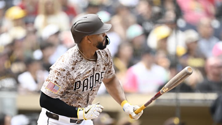 Sep 28, 2025; San Diego, California, USA; San Diego Padres shortstop Xander Bogaerts (2) hits an RBI double during the first inning against the Arizona Diamondbacks at Petco Park. 