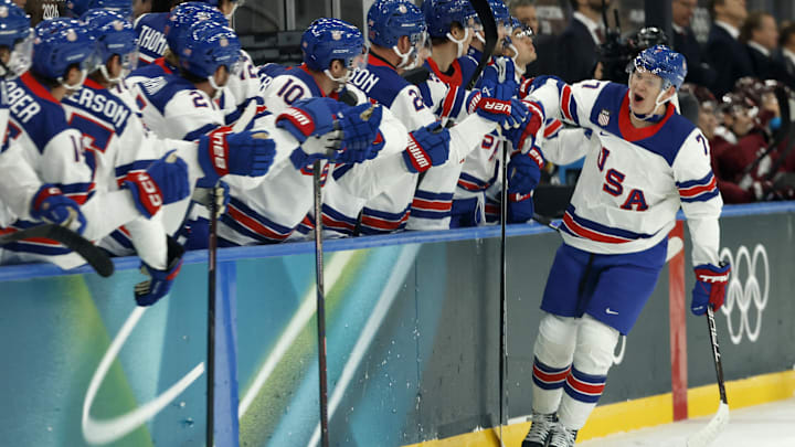 Feb 12, 2026; Milan, Italy; Brady Tkachuk of United States celebrates scoring their first goal with teammates against Latvia in men's ice hockey group C play during the Milano Cortina 2026 Olympic Winter Games at Milano Santagiulia Ice Hockey Arena. Mandatory Credit: Geoff Burke-Imagn Images Feb 12, 2026; Milan, Italy; Brady Tkachuk of United States celebrates scoring their first goal with teammates against Latvia in men's ice hockey group C play during the Milano Cortina 2026 Olympic Winter Games at Milano Santagiulia Ice Hockey Arena. Mandatory Credit: Geoff Burke-Imagn Images