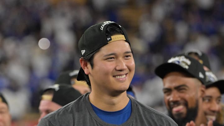 Oct 17, 2025; Los Angeles, California, USA; Los Angeles Dodgers two-way player Shohei Ohtani (17) is awarded the MVP of the NLCS after game four of the NLCS round for the 2025 MLB playoffs at Dodger Stadium. Mandatory Credit: Jayne Kamin-Oncea-Imagn Images