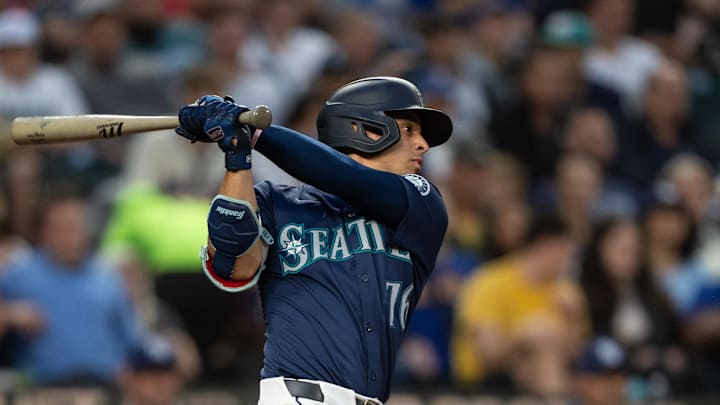 Seattle Mariners shortstop Leo Rivas (76) hits a RBI-single during the fourth inning against the Tampa Bay Rays at T-Mobile Park on Aug. 26. Seattle Mariners shortstop Leo Rivas (76) hits a RBI-single during the fourth inning against the Tampa Bay Rays at T-Mobile Park on Aug. 26.