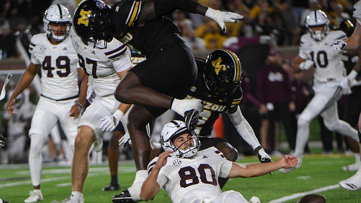 Nov 15, 2025; Columbia, Missouri, USA; Mississippi State kicker Kyle Ferrie (80) is unable to recover a fumble during the first half of a game. Nov 15, 2025; Columbia, Missouri, USA; Mississippi State kicker Kyle Ferrie (80) is unable to recover a fumble during the first half of a game.