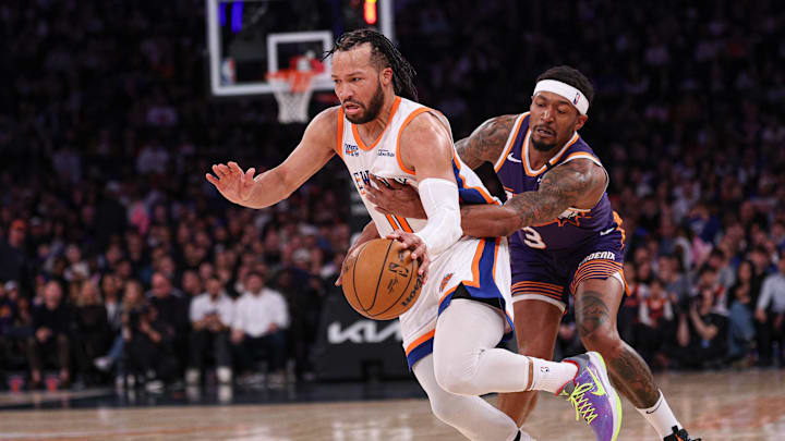 Apr 6, 2025; New York, New York, USA; New York Knicks guard Jalen Brunson (11) is fouled by Phoenix Suns guard Bradley Beal (3) during the second half at Madison Square Garden. Mandatory Credit: Vincent Carchietta-Imagn Images