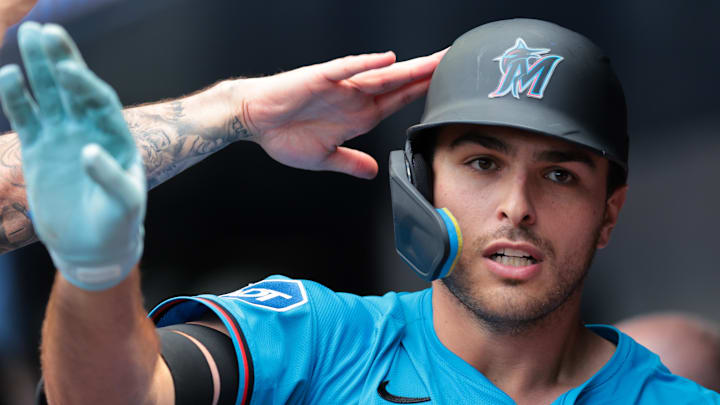 Apr 13, 2025; Miami, Florida, USA; Miami Marlins pinch hitter Matt Mervis (36) celebrates with teammates after hitting a three-run home run against the Washington Nationals during the seventh inning at loanDepot Park. Mandatory Credit: Sam Navarro-Imagn Images