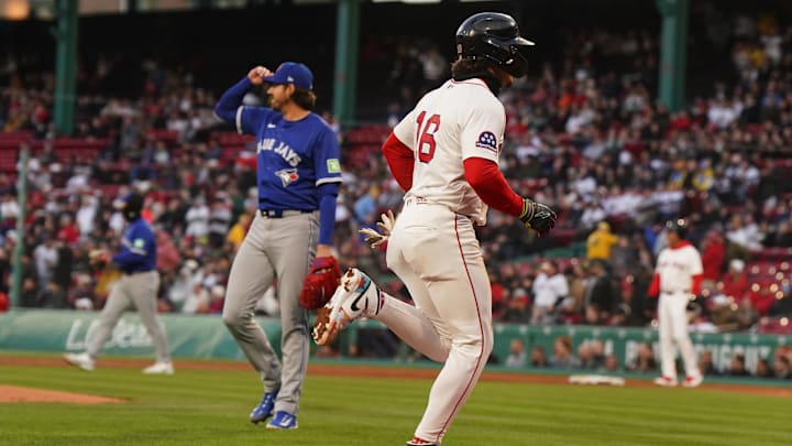 Boston Red Sox outfielder Jarren Duran (16) scores on a sacrifice against the Toronto Blue Jays in the first inning at Fenway Park on April 9.
