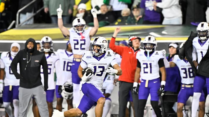 Dec 20, 2025; Eugene, OR, USA; James Madison Dukes wide receiver Landon Ellis (13) runs after making a catch during the first quarter against the Oregon Ducks at Autzen Stadium. Mandatory Credit: Craig Strobeck-Imagn Images