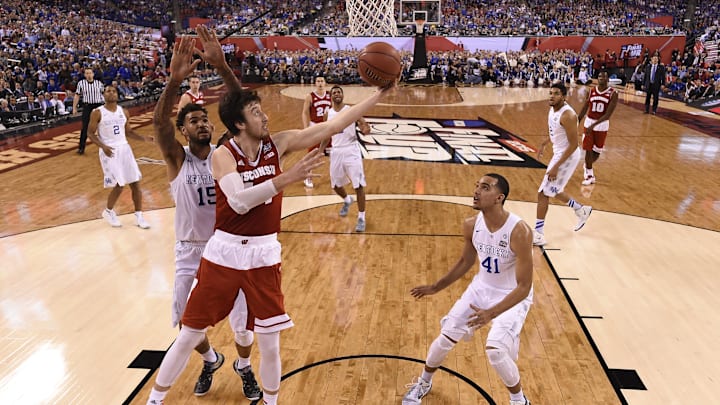 Apr 4, 2015; Indianapolis, IN, USA; Wisconsin Badgers forward Frank Kaminsky (44) shoots the ball against Kentucky Wildcats forward Willie Cauley-Stein (15) during the second half of the 2015 NCAA Men's Division I Championship semi-final game at Lucas Oil Stadium. Mandatory Credit: Chris Steppig/NCAA Photos-Pool Photo via Imagn Images