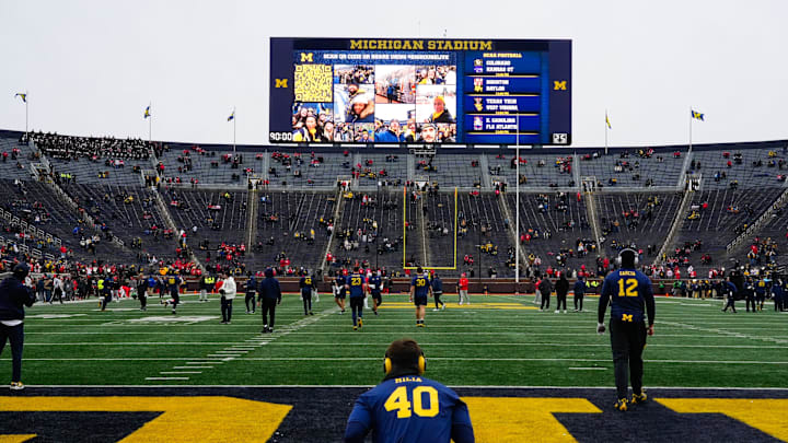 Michigan Wolverines warm-up before the game against the Ohio State Buckeyes at Michigan Stadium on Saturday, Nov. 29, 2025 in Ann Arbor, Michigan.
