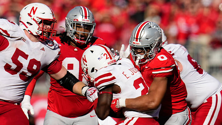 Ohio State Buckeyes linebacker Cody Simon (0) tackles Nebraska Cornhuskers running back Emmett Johnson (21) during the second half of the NCAA football game at Ohio Stadium in Columbus on Saturday, Oct. 26, 2024. Ohio State won 21-17.