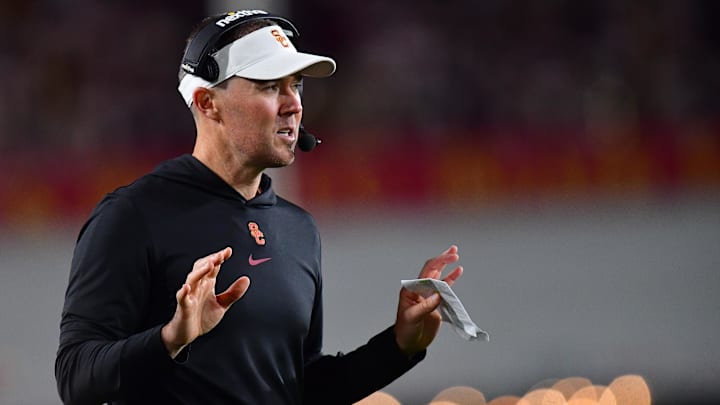 Oct 7, 2023; Los Angeles, California, USA; Southern California Trojans head coach Lincoln Riley watches game action against the Arizona Wildcats during the first half at Los Angeles Memorial Coliseum. Mandatory Credit: Gary A. Vasquez-Imagn Images