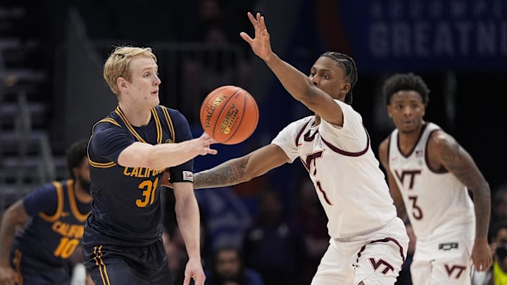Cal's Rytis Petraitis passes the ball against Virginia Tech