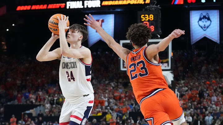 UConn Huskies guard Braylon Mullins (24) shoots and makes a three point basket Saturday, April 4, 2026, during a Final Four game against the Illinois Fighting Illini at Lucas Oil Stadium in Indianapolis. UConn Huskies guard Braylon Mullins (24) shoots and makes a three point basket Saturday, April 4, 2026, during a Final Four game against the Illinois Fighting Illini at Lucas Oil Stadium in Indianapolis.