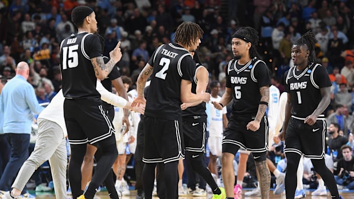 The VCU Rams celebrate Thursday, March 19, 2026, during the NCAA Men’s Basketball Tournament first round game against the North Carolina Tar Heels at Bon Secours Wellness Arena in Greenville, South Carolina. VCU Rams won 82-78 in OT. The VCU Rams celebrate Thursday, March 19, 2026, during the NCAA Men’s Basketball Tournament first round game against the North Carolina Tar Heels at Bon Secours Wellness Arena in Greenville, South Carolina. VCU Rams won 82-78 in OT.
