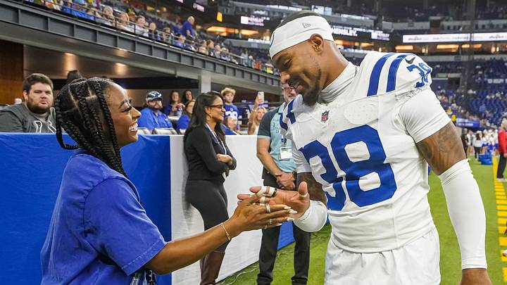 Simone Biles and Jonathan Owens share a sweet moment before the Indianapolis Colts preseason game. Simone Biles and Jonathan Owens share a sweet moment before the Indianapolis Colts preseason game.