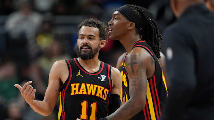 Trae Young reacts with Terance Mann