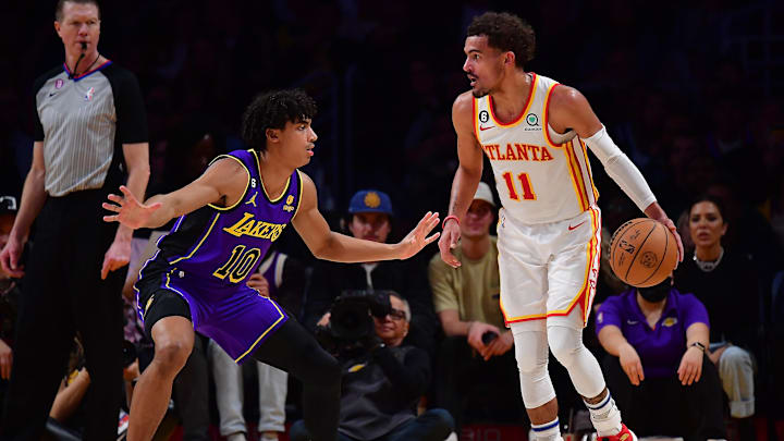 Atlanta Hawks guard Trae Young (11) controls the ball.