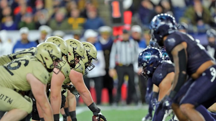 Dec 9, 2023; Foxborough, Massachusetts, USA; Army Black Knights offensive lineman Brady Small (51) lines up at the line of scrimmage against the Navy Midshipmen during the second half of the Army-Navy Game at Gillette Stadium. Mandatory Credit: Danny Wild-Imagn Images