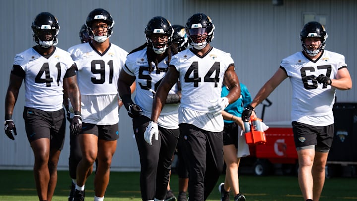 Jacksonville Jaguars defensive end Josh Hines-Allen (41), Jacksonville Jaguars defensive end Arik Armstead (91), Jacksonville Jaguars defensive tackle DaVon Hamilton (52), Jacksonville Jaguars defensive end Travon Walker (44) and Jaguars defensive lineman Eli Mostaert (67) walk to their next drill during the Jacksonville Jaguars’ third mandatory minicamp Thursday June 12, 2025 at the Miller Electric Center in Jacksonville, Fla. 