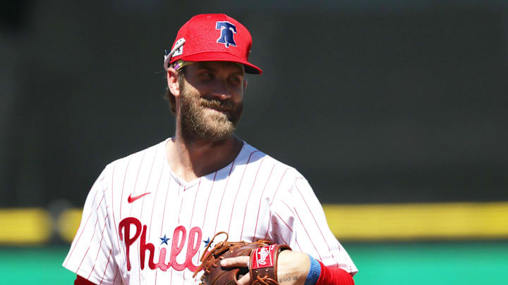 Mar 19, 2025; Clearwater, Florida, USA;  Philadelphia Phillies first base Bryce Harper (3) looks on during the sixth inning against the New York Yankees  at BayCare Ballpark.