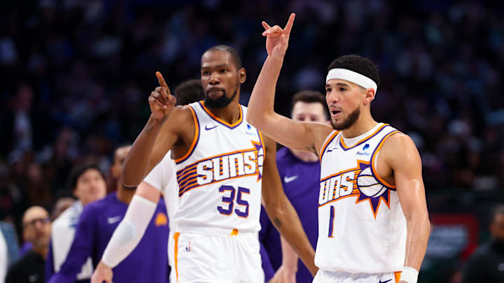 Jan 24, 2024; Dallas, Texas, USA;  Phoenix Suns guard Devin Booker (1) celebrates with Phoenix Suns