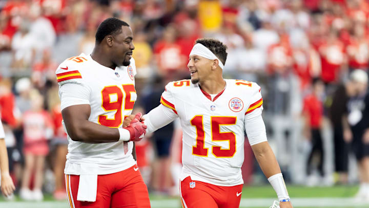 Aug 9, 2025; Glendale, Arizona, USA; Kansas City Chiefs defensive tackle Chris Jones (95) with quarterback Patrick Mahomes (15) against the Arizona Cardinals during a preseason NFL game at State Farm Stadium. Mandatory Credit: Mark J. Rebilas-Imagn Images Aug 9, 2025; Glendale, Arizona, USA; Kansas City Chiefs defensive tackle Chris Jones (95) with quarterback Patrick Mahomes (15) against the Arizona Cardinals during a preseason NFL game at State Farm Stadium. Mandatory Credit: Mark J. Rebilas-Imagn Images