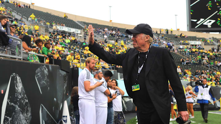 Sep 7, 2019; Eugene, OR, USA; Nike co-founder and current chairman Phil Knight waves to fans before Oregon Ducks play Nevada Wolf Pack at Autzen Stadium. Mandatory Credit: Jaime Valdez-Imagn Images