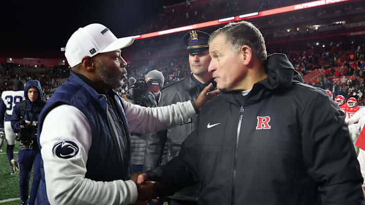 Nov 29, 2025; Piscataway, New Jersey, USA; Penn State Nittany Lions interim head coach Terry Smith and Rutgers Scarlet Knights head coach Greg Schiano shake hands after the game at SHI Stadium. Mandatory Credit: Vincent Carchietta-Imagn Images