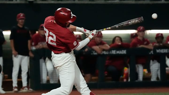 Mar 18, 2025; Tuscaloosa AL, USA; Alabama batter Jason Torres connects for a bloop single that scored a run against South Alabama at Sewell-Thomas Stadium.