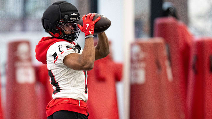 Cincinnati Bearcats wide receiver Cyrus Allen (4) catches a pass during football practice at Sheakley Athletic Performance Center in Cincinnati on Dec. 18, 2025.